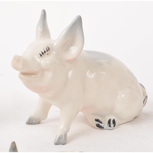 11 - Beswick - A collection of five 20th century porcelain pig figurines, comprising of, 'CH Wall CH Boy ... 