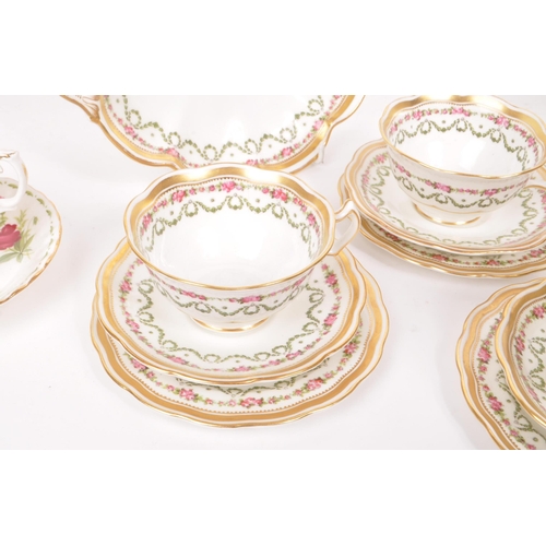 111 - George Jones - A collection of 19th century Crescent pattern bone china cups, saucers and side plate... 