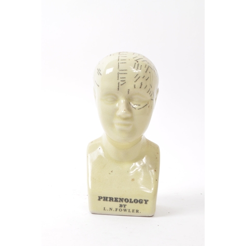 117 - L. N. Fowler - A small mid century ceramic Phrenology bust. Having a sectional cranium in white colo... 