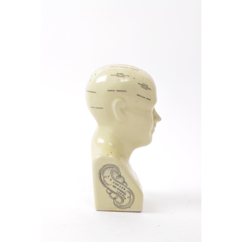 117 - L. N. Fowler - A small mid century ceramic Phrenology bust. Having a sectional cranium in white colo... 