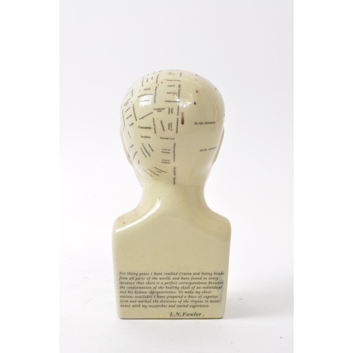 117 - L. N. Fowler - A small mid century ceramic Phrenology bust. Having a sectional cranium in white colo... 