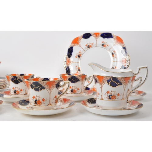 119 - Wetley - Early 20th century English bone china tea service pieces, in an imari-style design. Compris... 