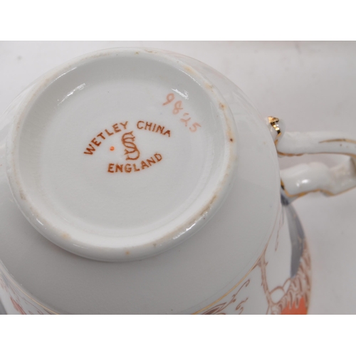 119 - Wetley - Early 20th century English bone china tea service pieces, in an imari-style design. Compris... 