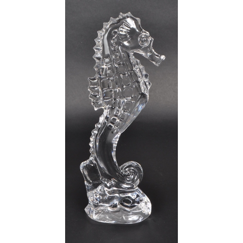 121 - Waterford - A cut crystal glass ornament / figure of a seahorse. Together with a Marquis Waterford m... 