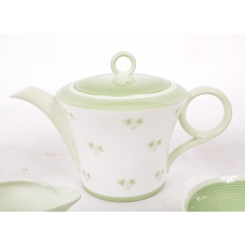 128 - Shelley - An Art Deco vintage 20th century china Spring pattern tea set for two. Comprising of cups,... 