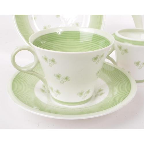 128 - Shelley - An Art Deco vintage 20th century china Spring pattern tea set for two. Comprising of cups,... 