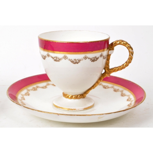 132 - Two 19th-century porcelain teacups and saucers, featuring rope twist handles to the teacups, a pink ... 