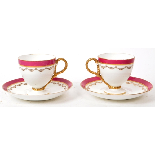 132 - Two 19th-century porcelain teacups and saucers, featuring rope twist handles to the teacups, a pink ... 