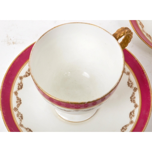 132 - Two 19th-century porcelain teacups and saucers, featuring rope twist handles to the teacups, a pink ... 