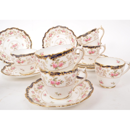 134 - Coalport - An early 20th-century porcelain eleven-person tea / coffee service set. Includes eleven c... 