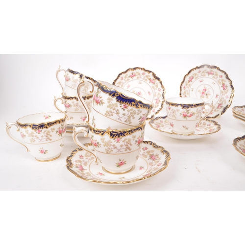 134 - Coalport - An early 20th-century porcelain eleven-person tea / coffee service set. Includes eleven c... 