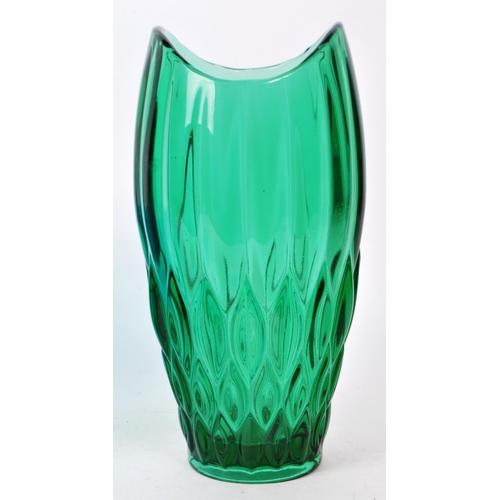 136 - Two pieces of vintage mid-20th-century glass table pieces, comprised of a green vase, and a blue han... 