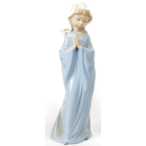 153 - Lladro - Nao - Collection of five late 20th-century Spanish porcelain figures, including examples su... 