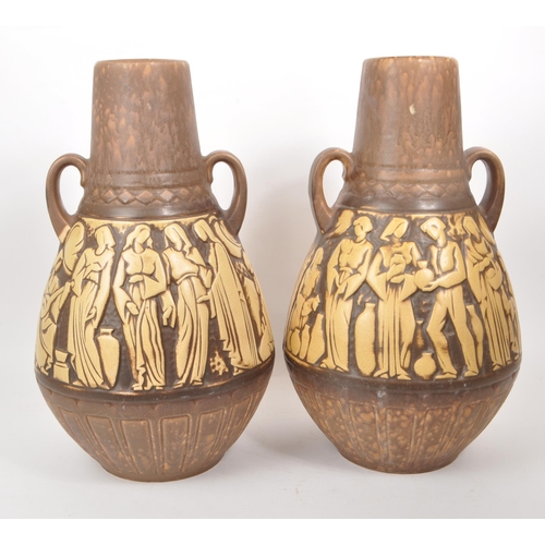 155 - A pair of mid-20th-century West German large studio pottery vases, both twin-handled with brown and ... 