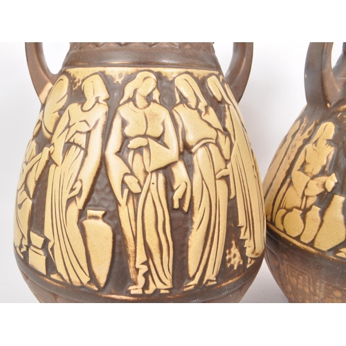 155 - A pair of mid-20th-century West German large studio pottery vases, both twin-handled with brown and ... 