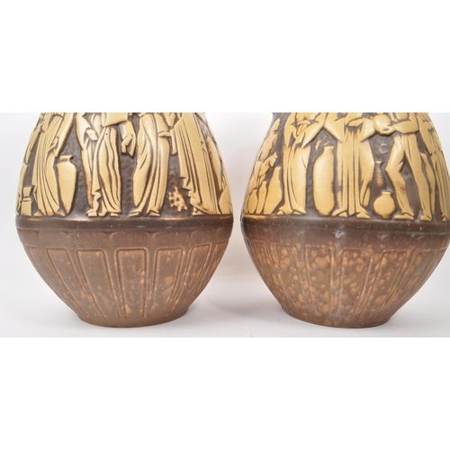 155 - A pair of mid-20th-century West German large studio pottery vases, both twin-handled with brown and ... 