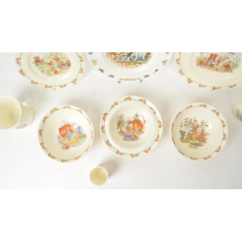 157 - Royal Doulton - Bunnykins - A collection of 20th-century bone china tableware, comprised of three pl... 