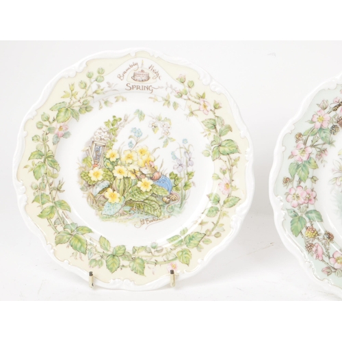 162 - Royal Doulton - Brambly Hedge - A collection of four 1982 bone china plates, each decorated accordin... 