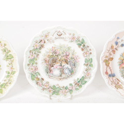 162 - Royal Doulton - Brambly Hedge - A collection of four 1982 bone china plates, each decorated accordin... 