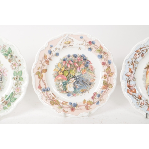 162 - Royal Doulton - Brambly Hedge - A collection of four 1982 bone china plates, each decorated accordin... 