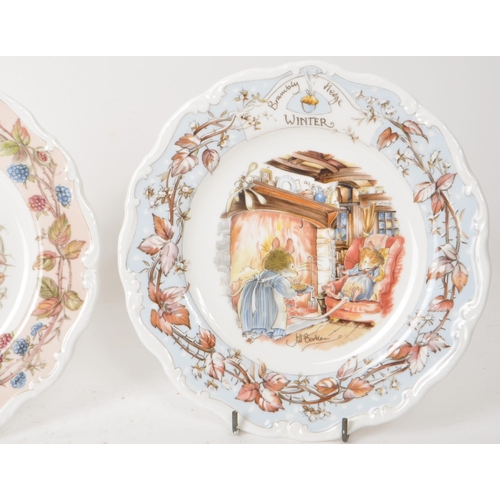 162 - Royal Doulton - Brambly Hedge - A collection of four 1982 bone china plates, each decorated accordin... 