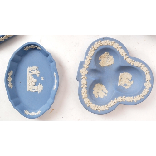 164 - Wedgwood - Jasperware - A collection of 20th century blue stoneware pieces, examples including lidde... 