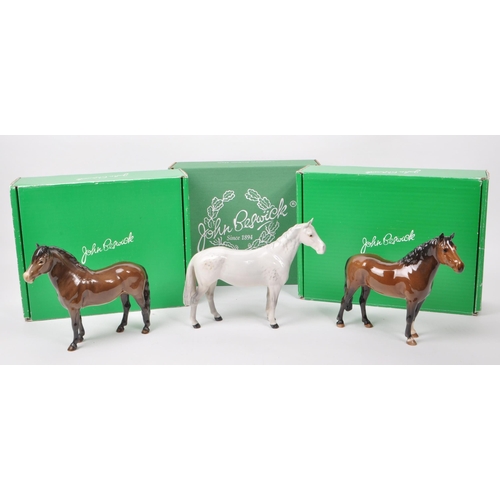 17 - Beswick - A collection of three mid century porcelain horse figurines, comprising of an Exmoor Horse... 