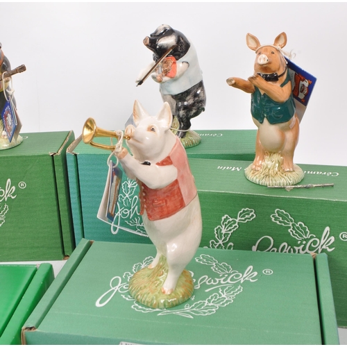 19 - Beswick - A collection of nine (full set) 1990s ceramic ''Pig Promenade' figurines, comprising of: A... 