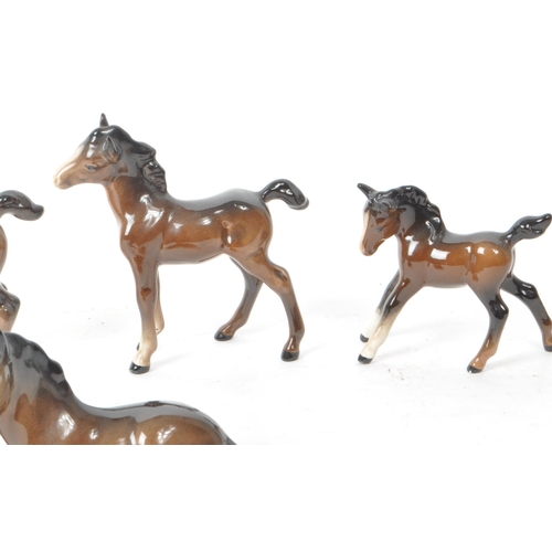 193 - Beswick - Five mid 20th century brown horse foal porcelain figurines. Beswick maker mark printed to ... 