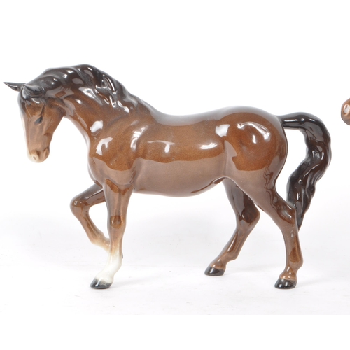 196 - Beswick - Three 20th century porcelain horse figurines, including a Dartmoor horse. All brown in col... 