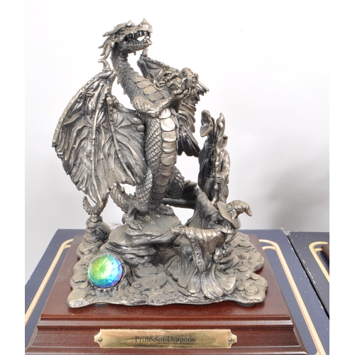 202 - Myth & Magic by The Tudor Mint - Seven early 21st-century cast pewter statue dragon figurines. I... 