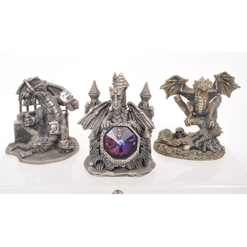 204 - Myth & Magic - Thirty-two cast pewter dragon and wizard figures, a majority by Myth & Magic ... 