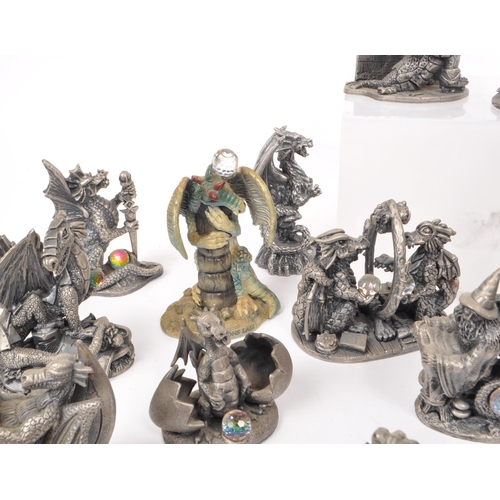 204 - Myth & Magic - Thirty-two cast pewter dragon and wizard figures, a majority by Myth & Magic ... 