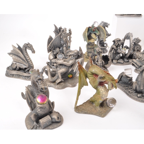 204 - Myth & Magic - Thirty-two cast pewter dragon and wizard figures, a majority by Myth & Magic ... 