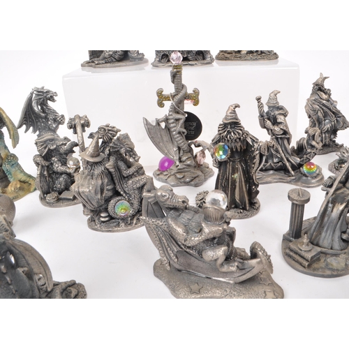 204 - Myth & Magic - Thirty-two cast pewter dragon and wizard figures, a majority by Myth & Magic ... 