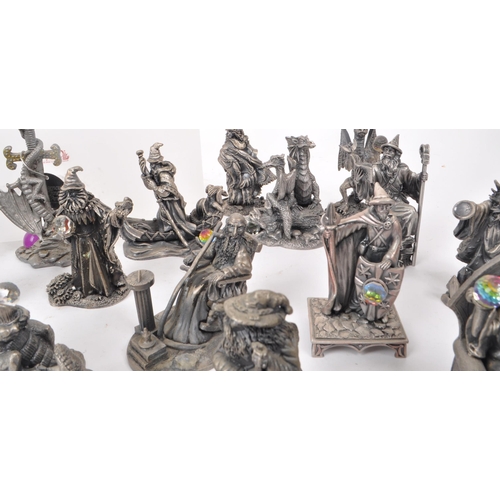 204 - Myth & Magic - Thirty-two cast pewter dragon and wizard figures, a majority by Myth & Magic ... 