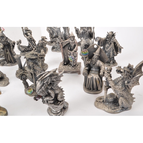 204 - Myth & Magic - Thirty-two cast pewter dragon and wizard figures, a majority by Myth & Magic ... 