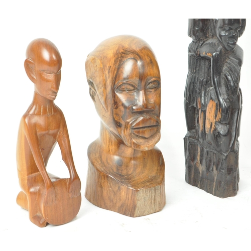 213 - A collection of five 20th-century tribal carvings and sculptures, comprising of head portraits, figu... 