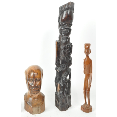 213 - A collection of five 20th-century tribal carvings and sculptures, comprising of head portraits, figu... 