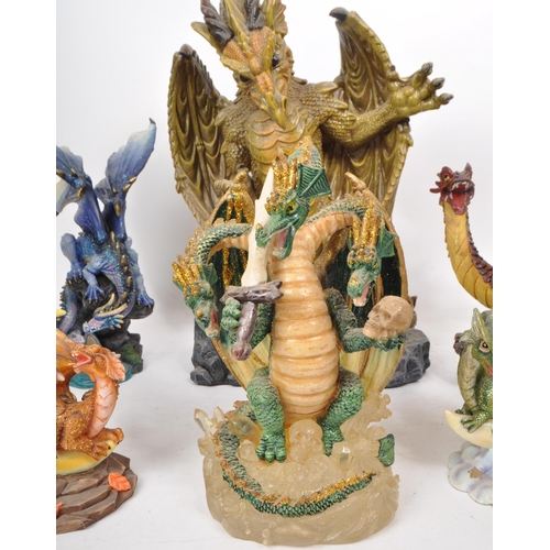 223 - A collection of nine contemporary resin / plastic dragon figures, from makers such as Veronese, Ench... 