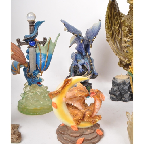 223 - A collection of nine contemporary resin / plastic dragon figures, from makers such as Veronese, Ench... 