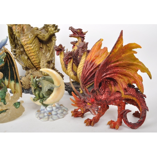 223 - A collection of nine contemporary resin / plastic dragon figures, from makers such as Veronese, Ench... 