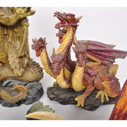 223 - A collection of nine contemporary resin / plastic dragon figures, from makers such as Veronese, Ench... 