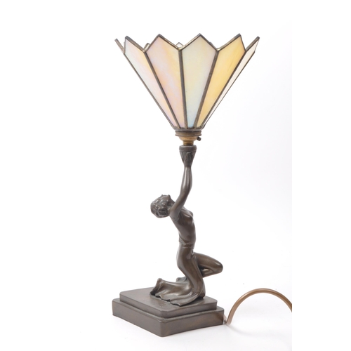 227 - A vintage late 20th century Tiffany / Art Deco style brass lamp, featuring a lady dancer figure hold... 