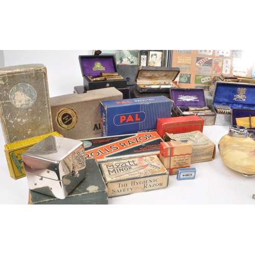 228 - A large collection of early and mid 20th century safety razors and related equipment. The collection... 