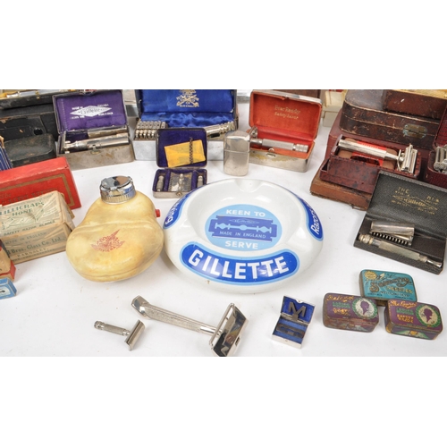 228 - A large collection of early and mid 20th century safety razors and related equipment. The collection... 