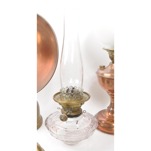 231 - A collection of Victorian 19th century and later oil lamps. Brass and copper construction with flute... 