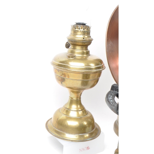 231 - A collection of Victorian 19th century and later oil lamps. Brass and copper construction with flute... 