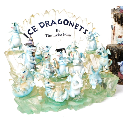 233 - The Tudor Mint - Land of The Dragons - Three 2002 resin display tiered stands, each with a collectio... 