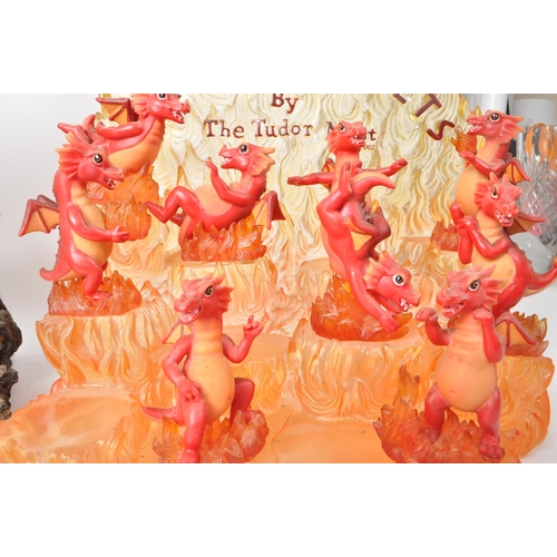 233 - The Tudor Mint - Land of The Dragons - Three 2002 resin display tiered stands, each with a collectio... 